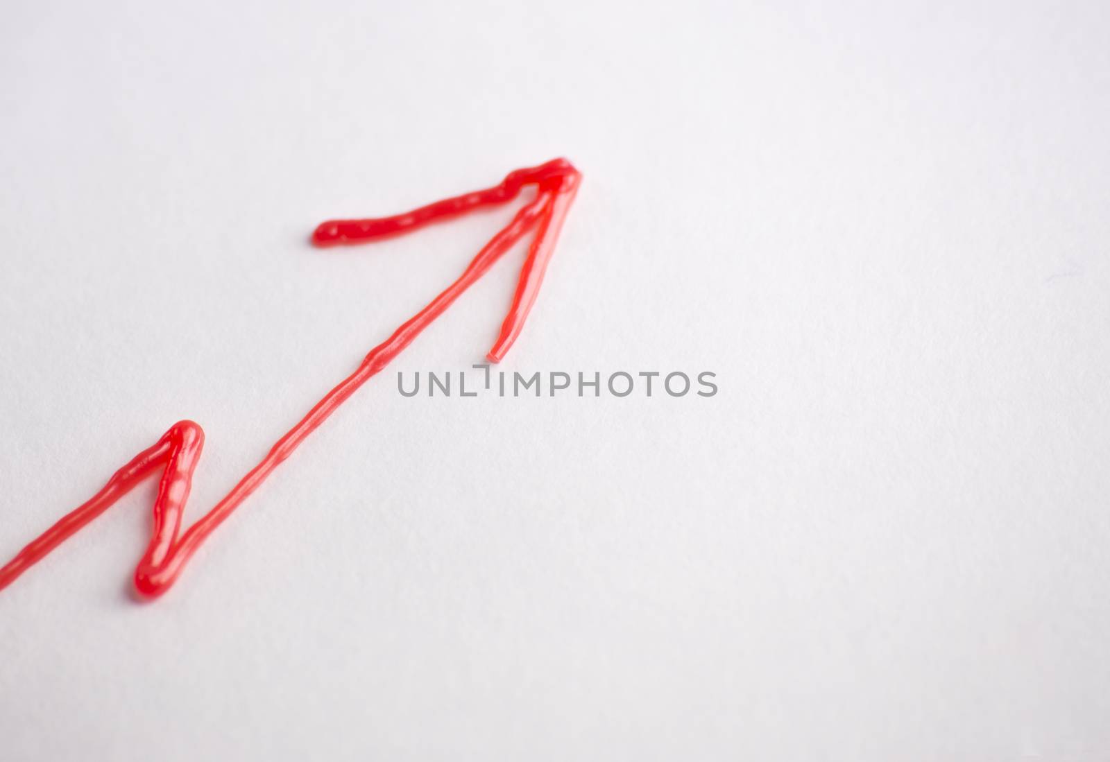 red arrow on white background by butenkow