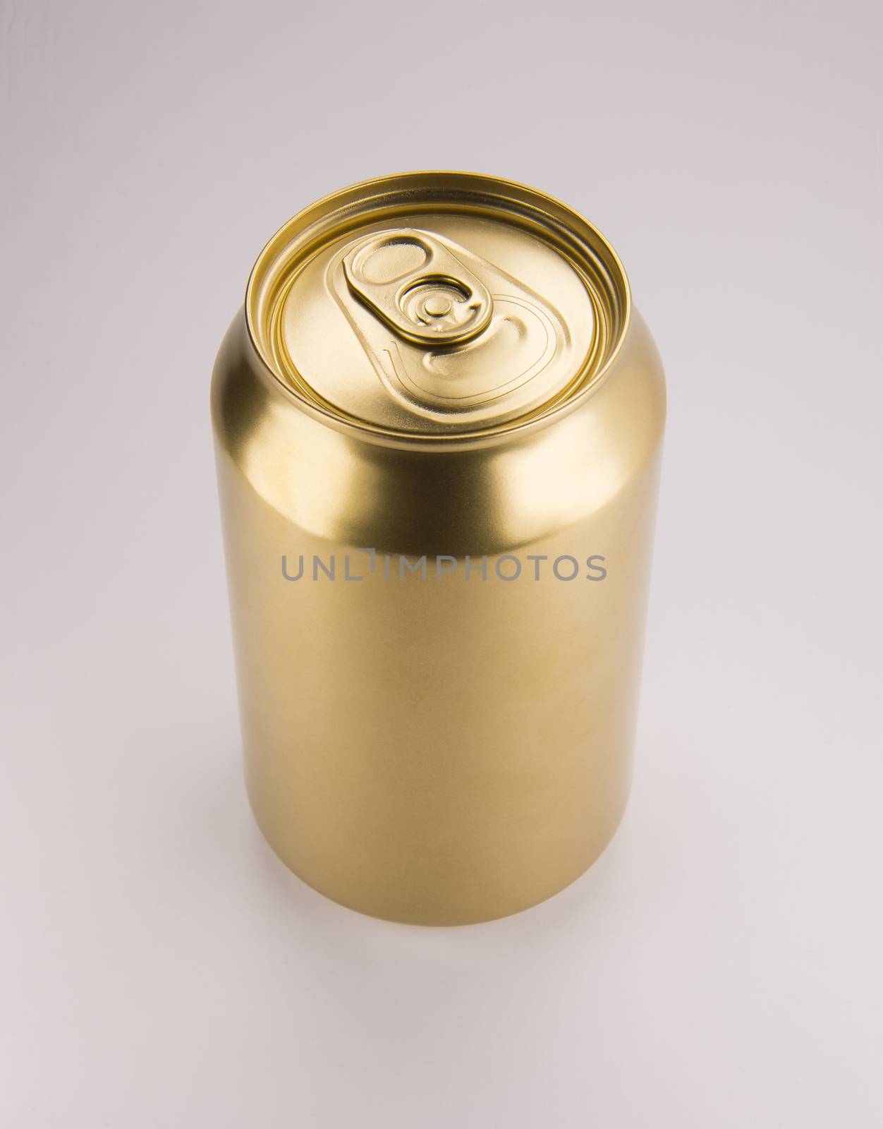 Gold can on white background by butenkow