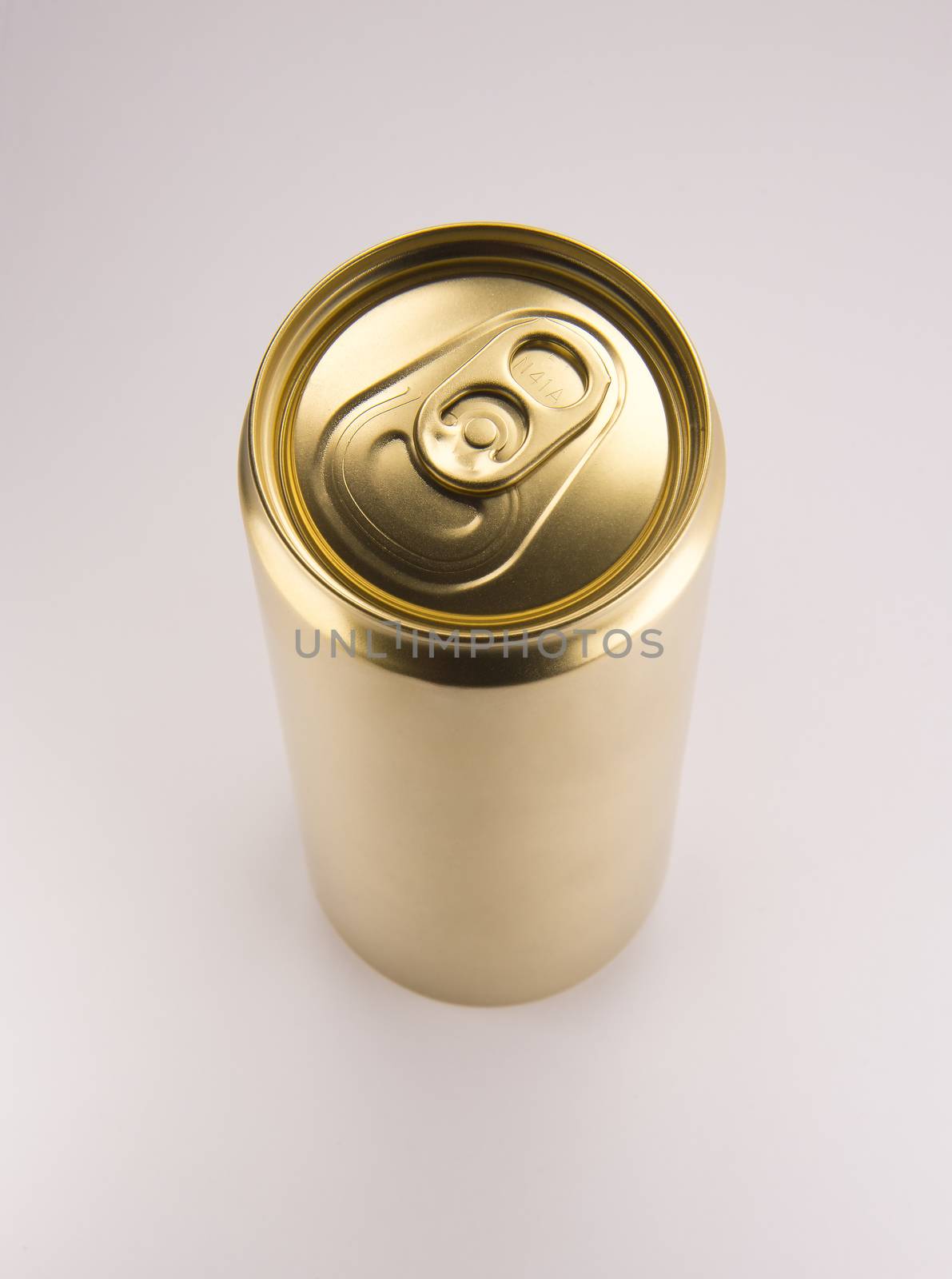 Gold can on white background by butenkow