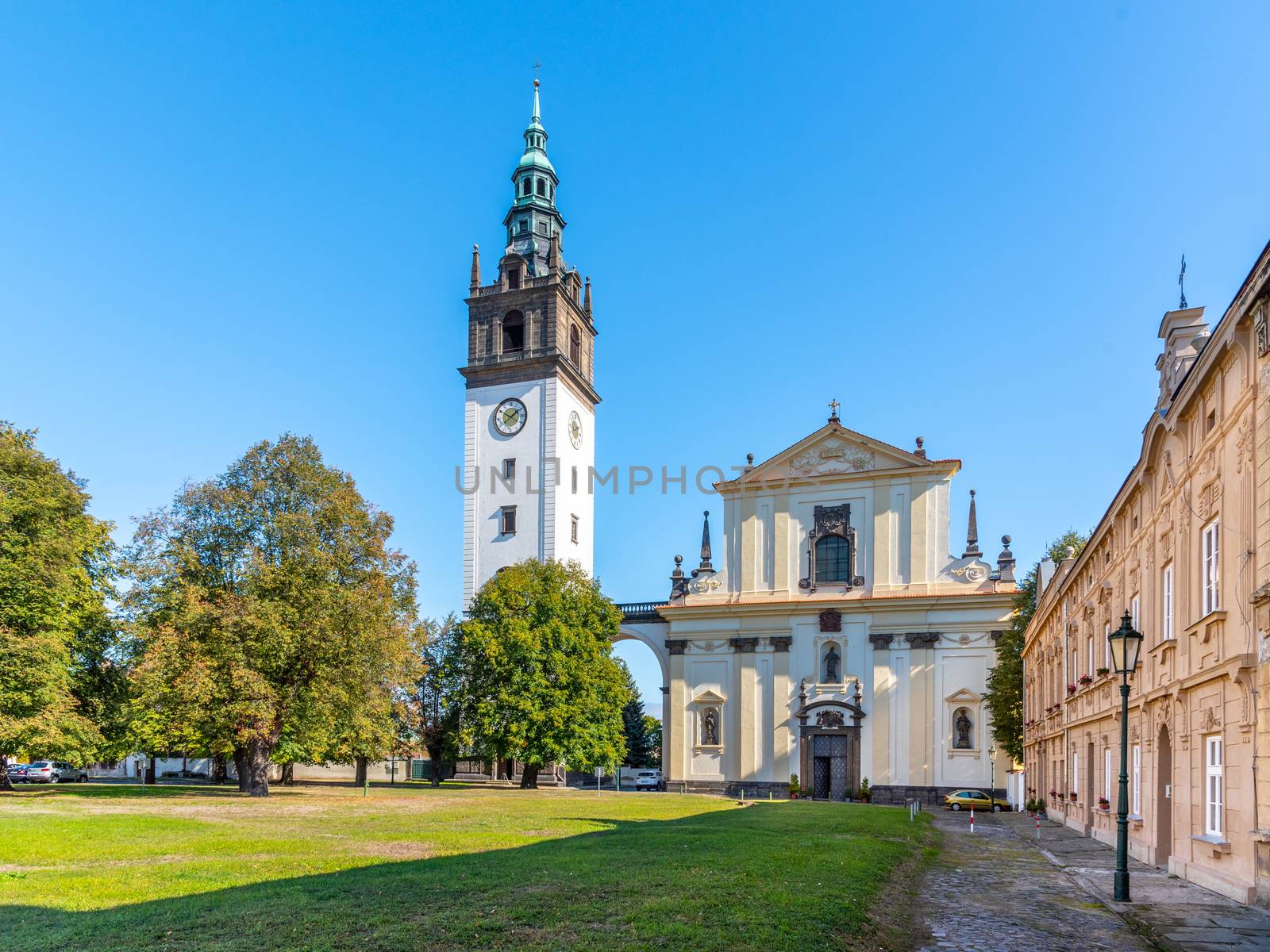 Baroque St. Stephen's Cathedral with bell tower at the Cathedral Square in Litomerice, Czech Republic by pyty