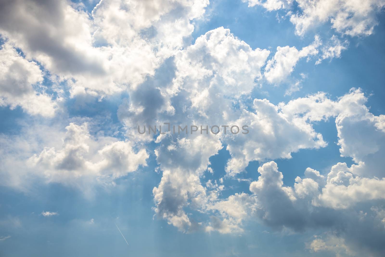 White clouds on the blue sky during the day. Nature landscape