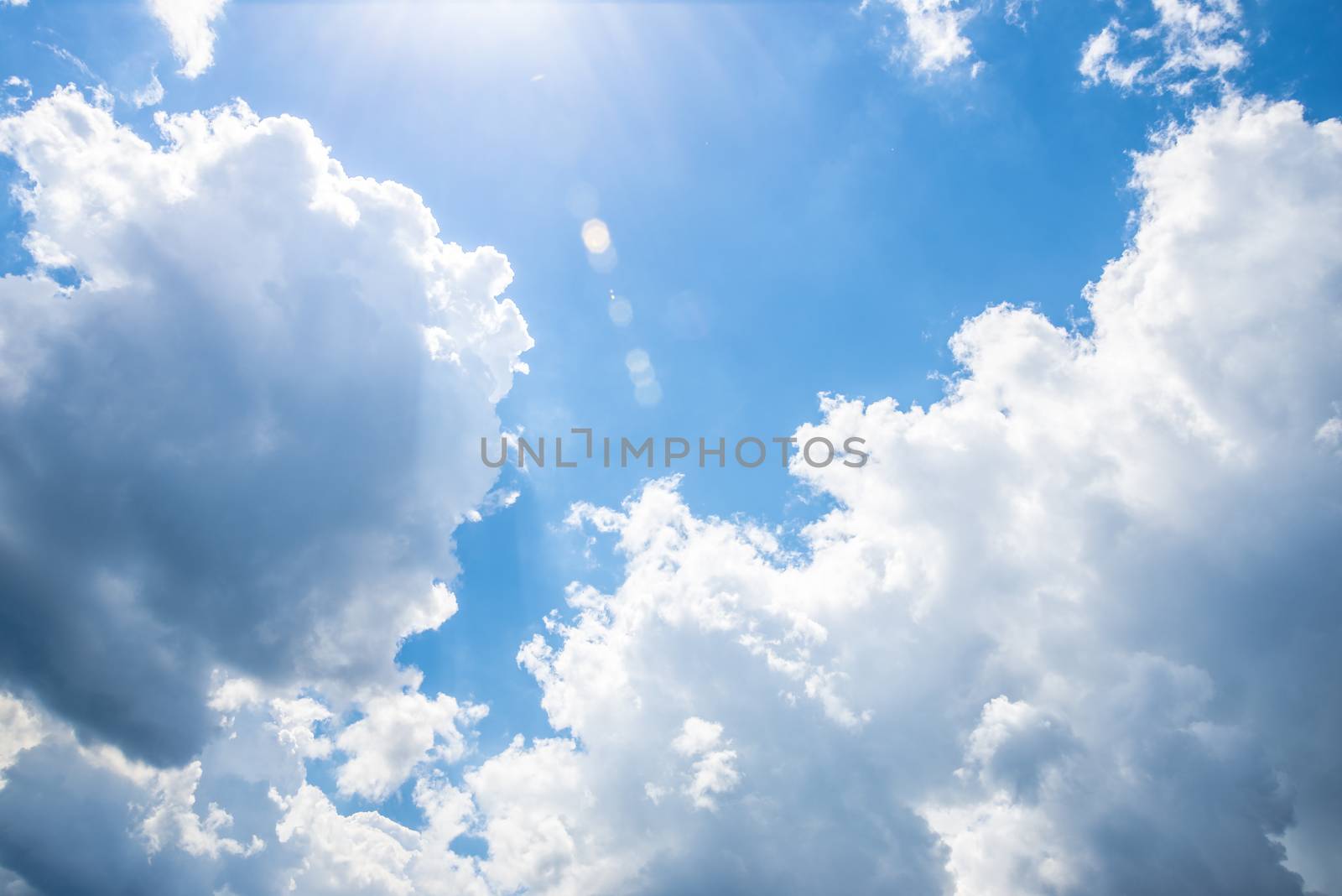 White clouds on the blue sky during the day. Nature landscape