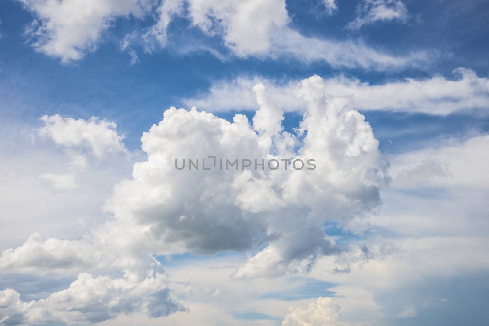 White clouds on the blue sky during the day. Nature landscape