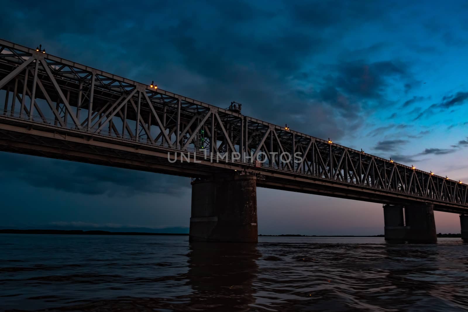 Bridge over the Amur river at sunset. Russia. Khabarovsk. Photo from the middle of the river