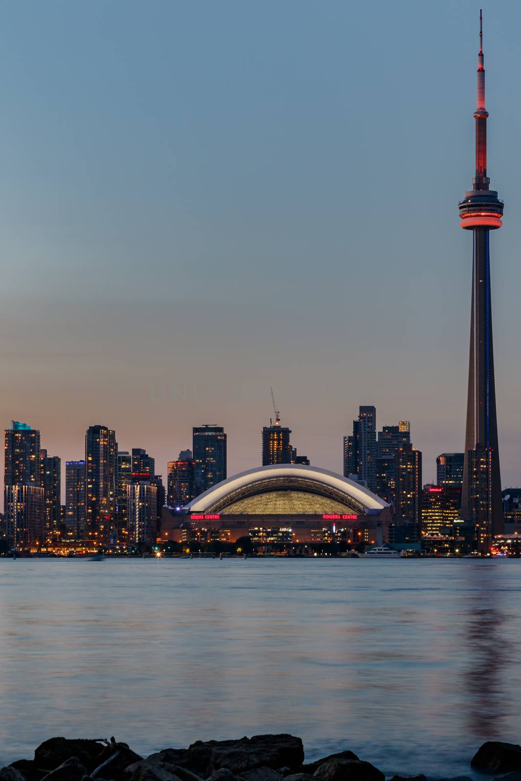 Night View of Downtown Toronto from Toronto Islands with the Lake Ontario, Canada.