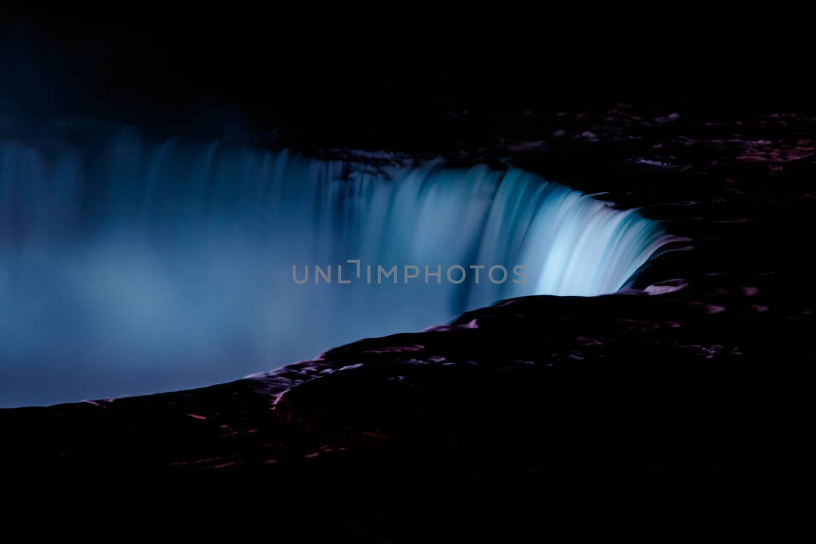 Fantastic Niagara Falls view with Colorful Lights at night, Canadian Falls, Ontario, Canada