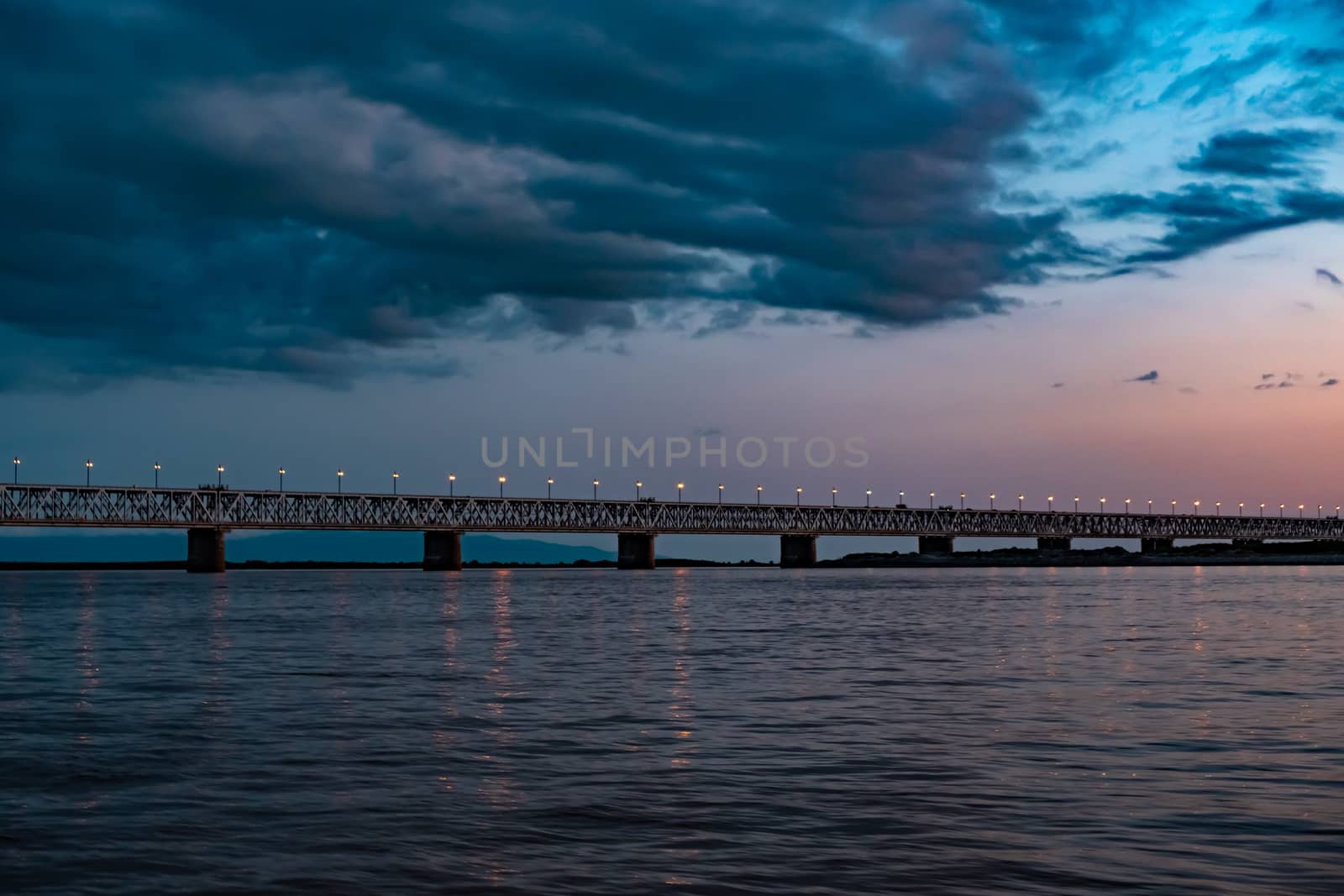 Bridge over the Amur river at sunset. Russia. Khabarovsk. Photo from the middle of the river