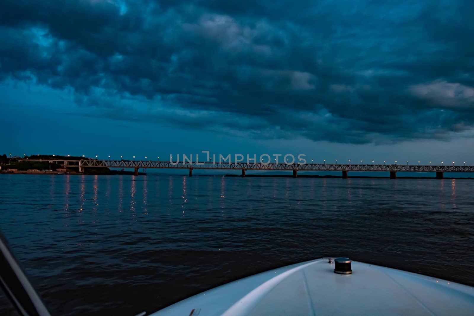 Bridge over the Amur river at sunset. Russia. Khabarovsk. Photo from the middle of the river. by rdv27