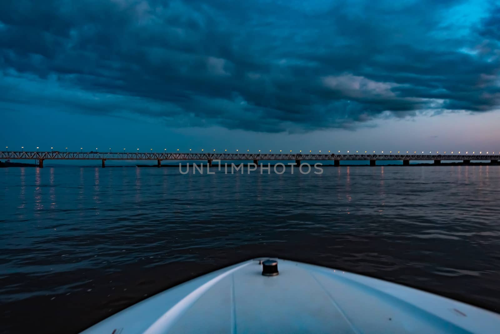 Bridge over the Amur river at sunset. Russia. Khabarovsk. Photo from the middle of the river