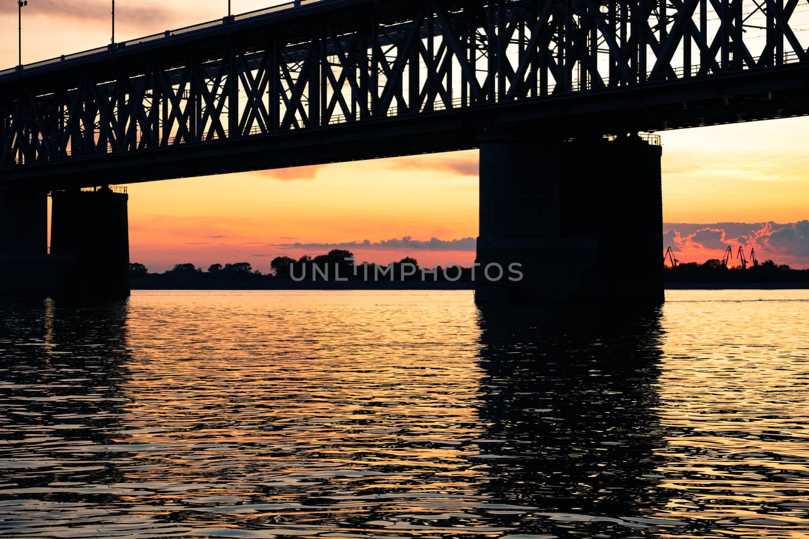 Bridge over the Amur river at sunset. Russia. Khabarovsk. Photo from the middle of the river. by rdv27