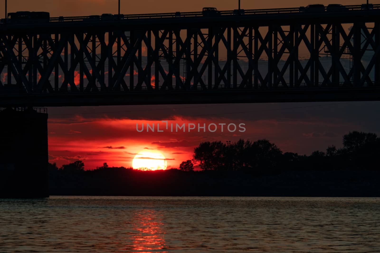 Bridge over the Amur river at sunset. Russia. Khabarovsk. Photo from the middle of the river. by rdv27