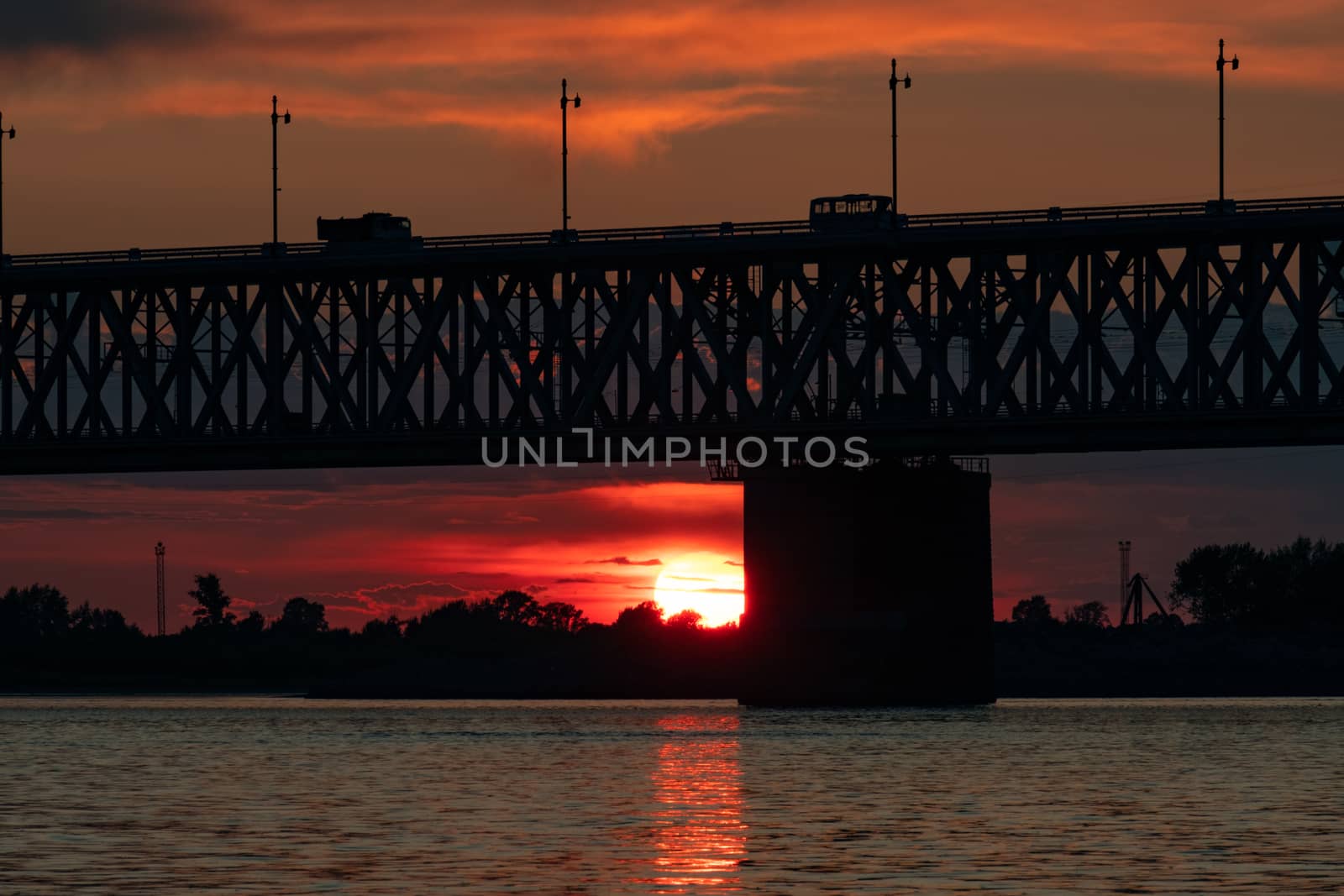 Bridge over the Amur river at sunset. Russia. Khabarovsk. Photo from the middle of the river. by rdv27