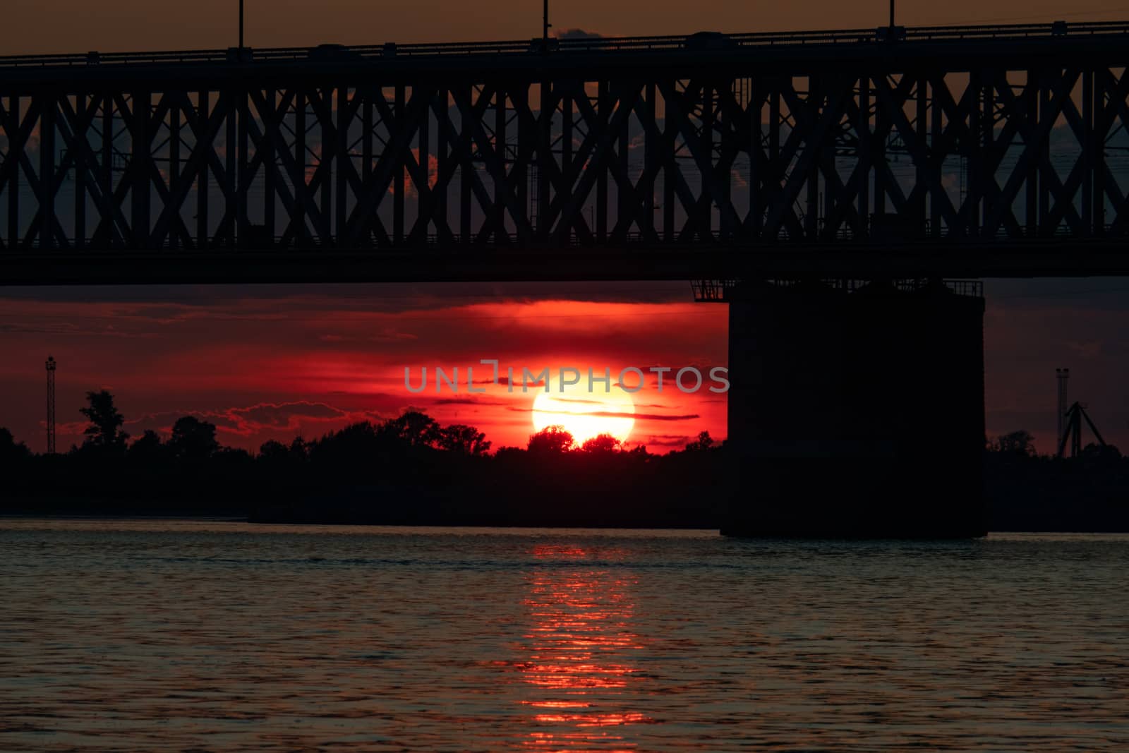 Bridge over the Amur river at sunset. Russia. Khabarovsk. Photo from the middle of the river. by rdv27