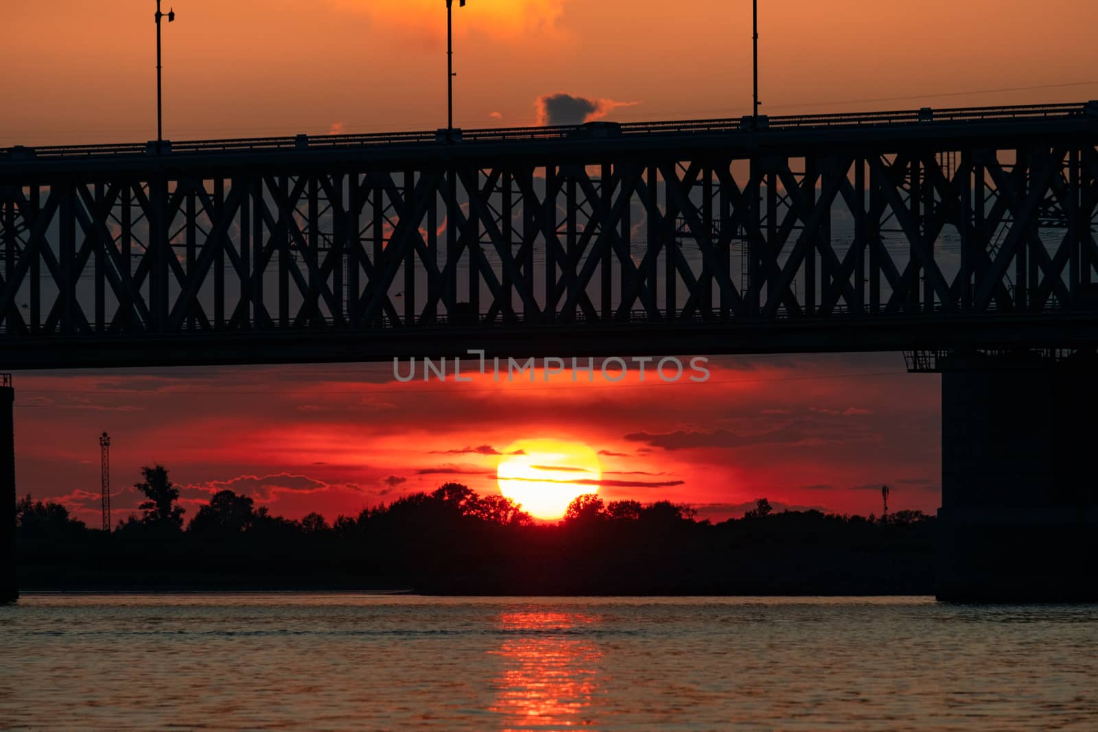 Bridge over the Amur river at sunset. Russia. Khabarovsk. Photo from the middle of the river. by rdv27