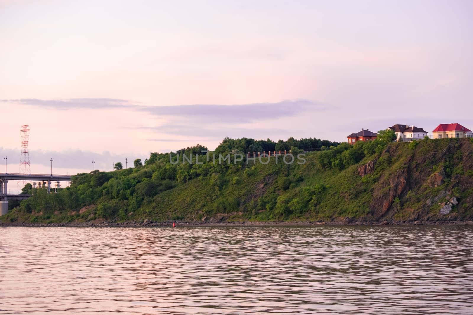 Bridge over the Amur river at sunset. Russia. Khabarovsk. Photo from the middle of the river. by rdv27