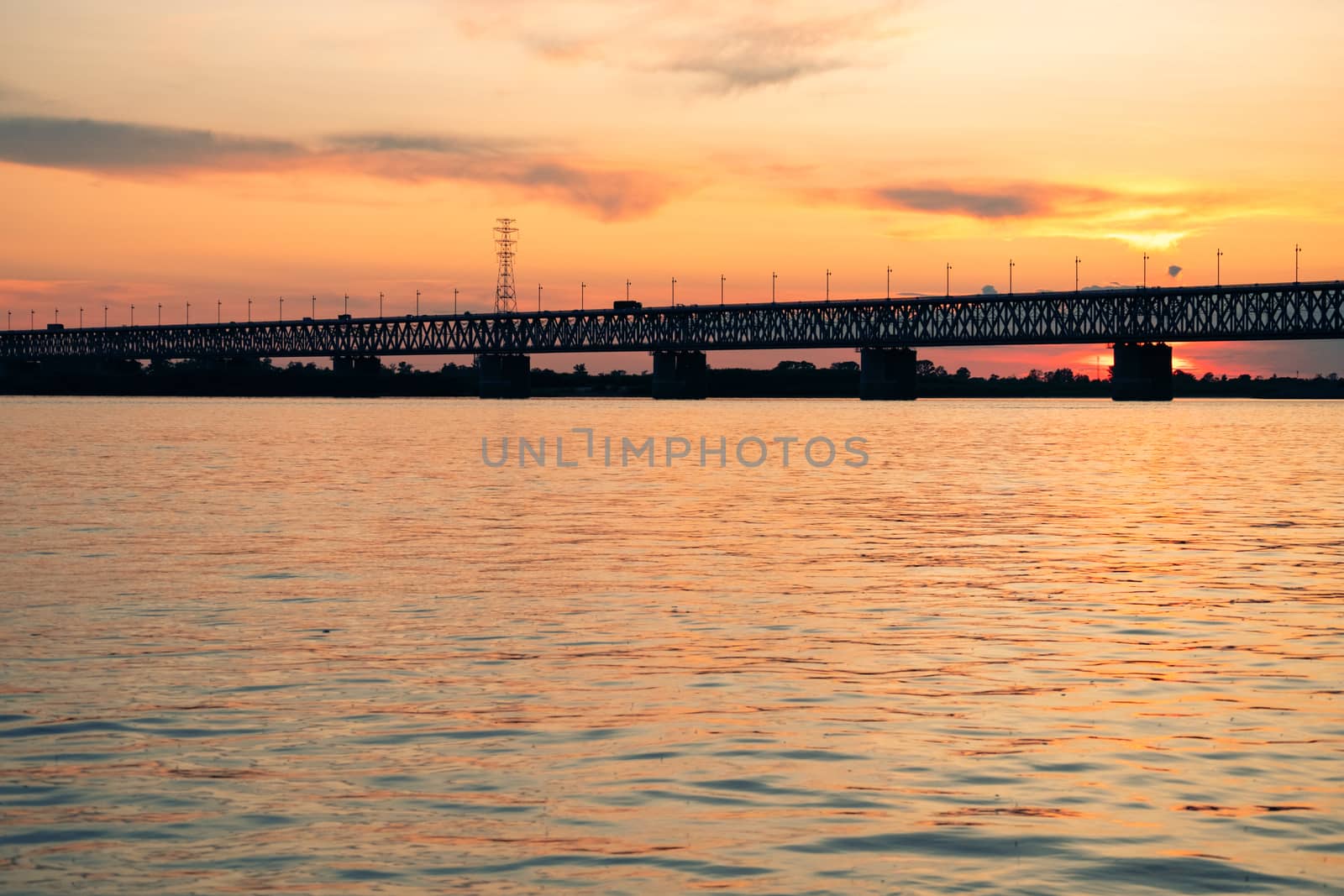 Bridge over the Amur river at sunset. Russia. Khabarovsk. Photo from the middle of the river. by rdv27