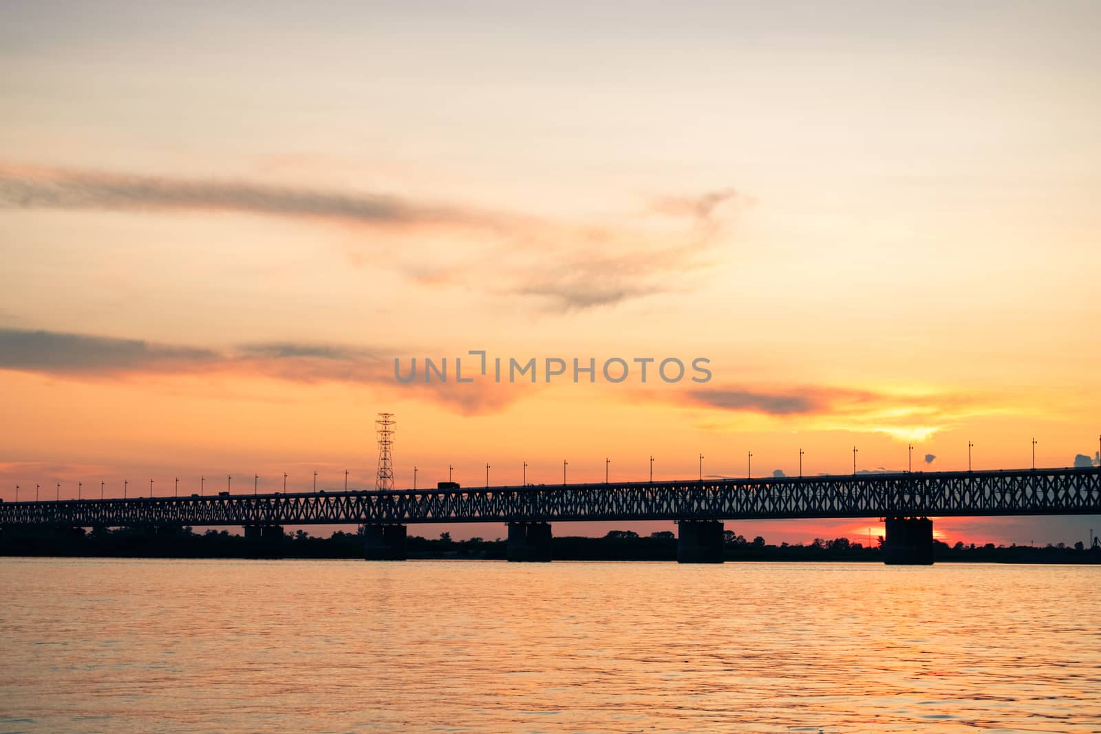 Bridge over the Amur river at sunset. Russia. Khabarovsk. Photo from the middle of the river. by rdv27