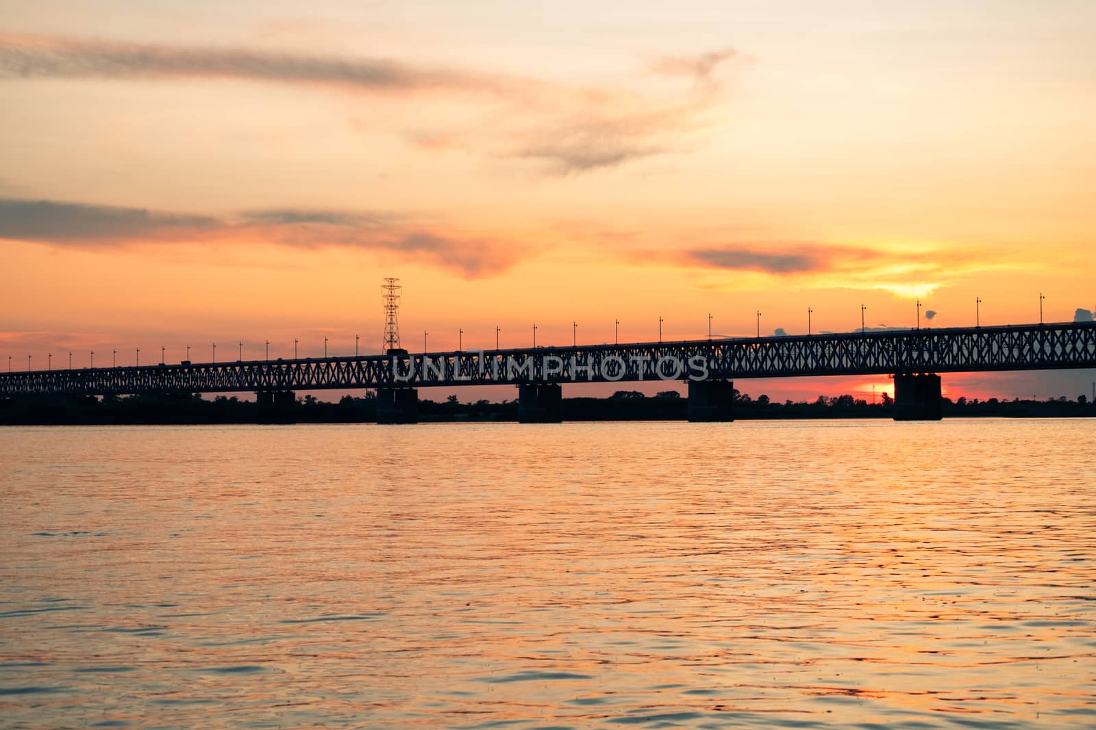 Bridge over the Amur river at sunset. Russia. Khabarovsk. Photo from the middle of the river. by rdv27