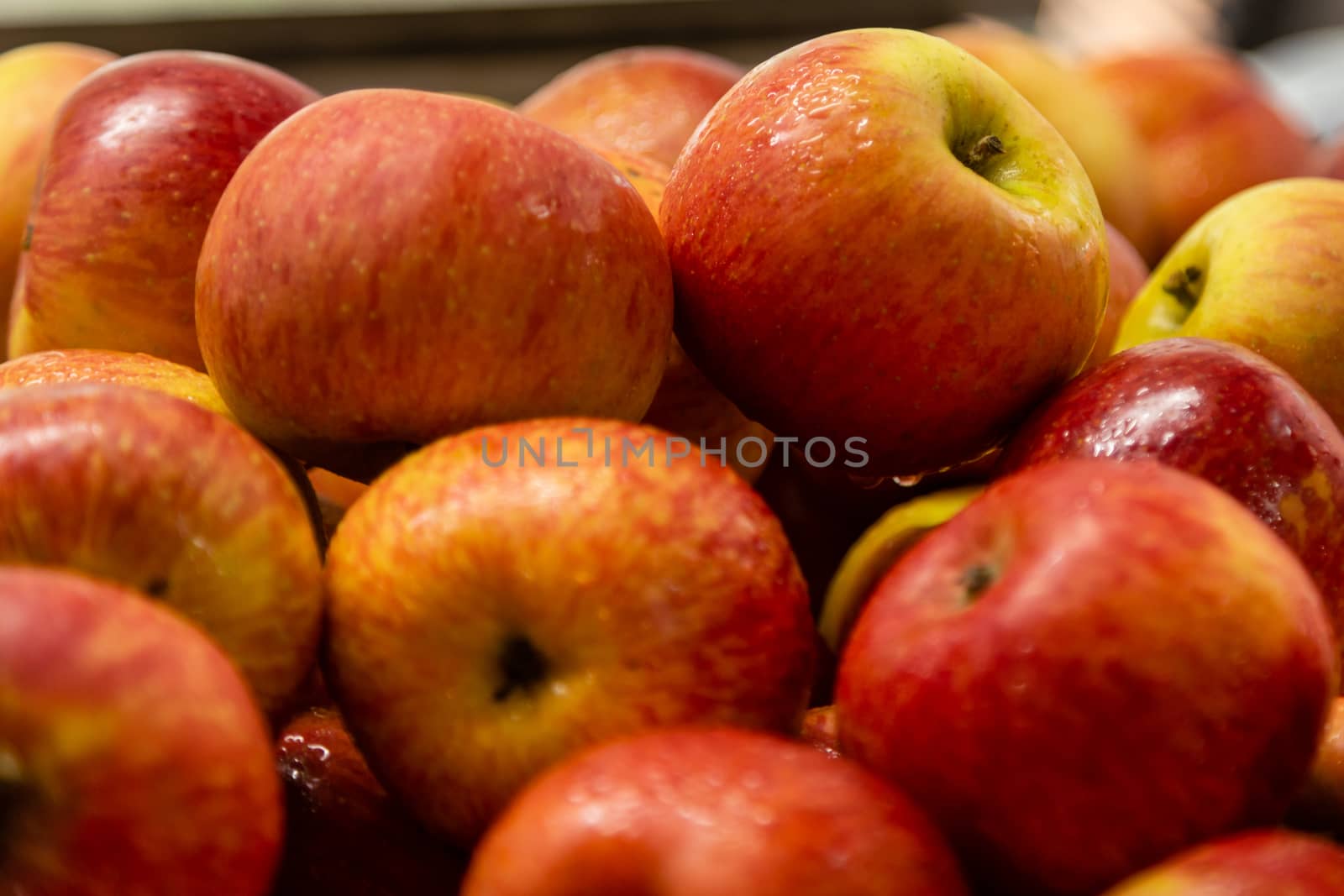 Fresh red and yellow apples at market