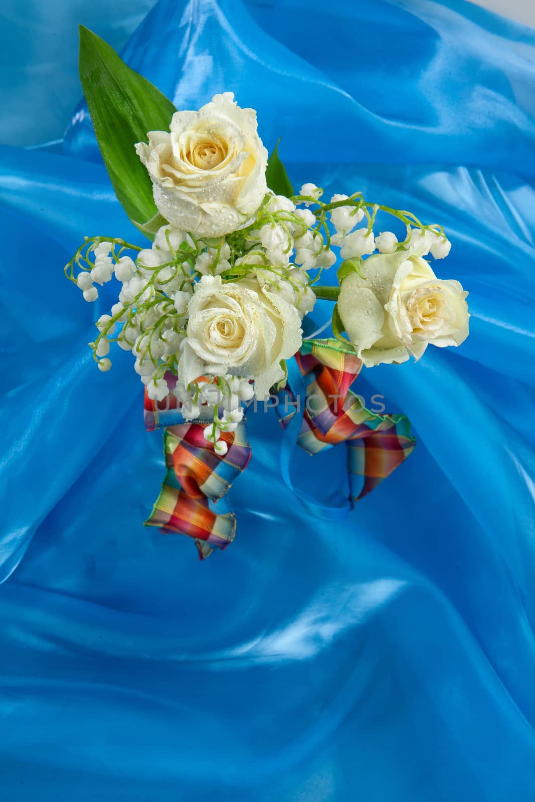Bouquet with flowers on a studio background