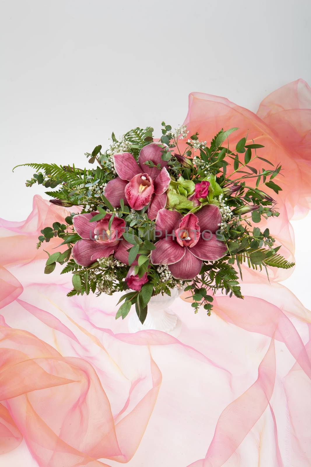 Bouquet of flowers on a fabric studio background