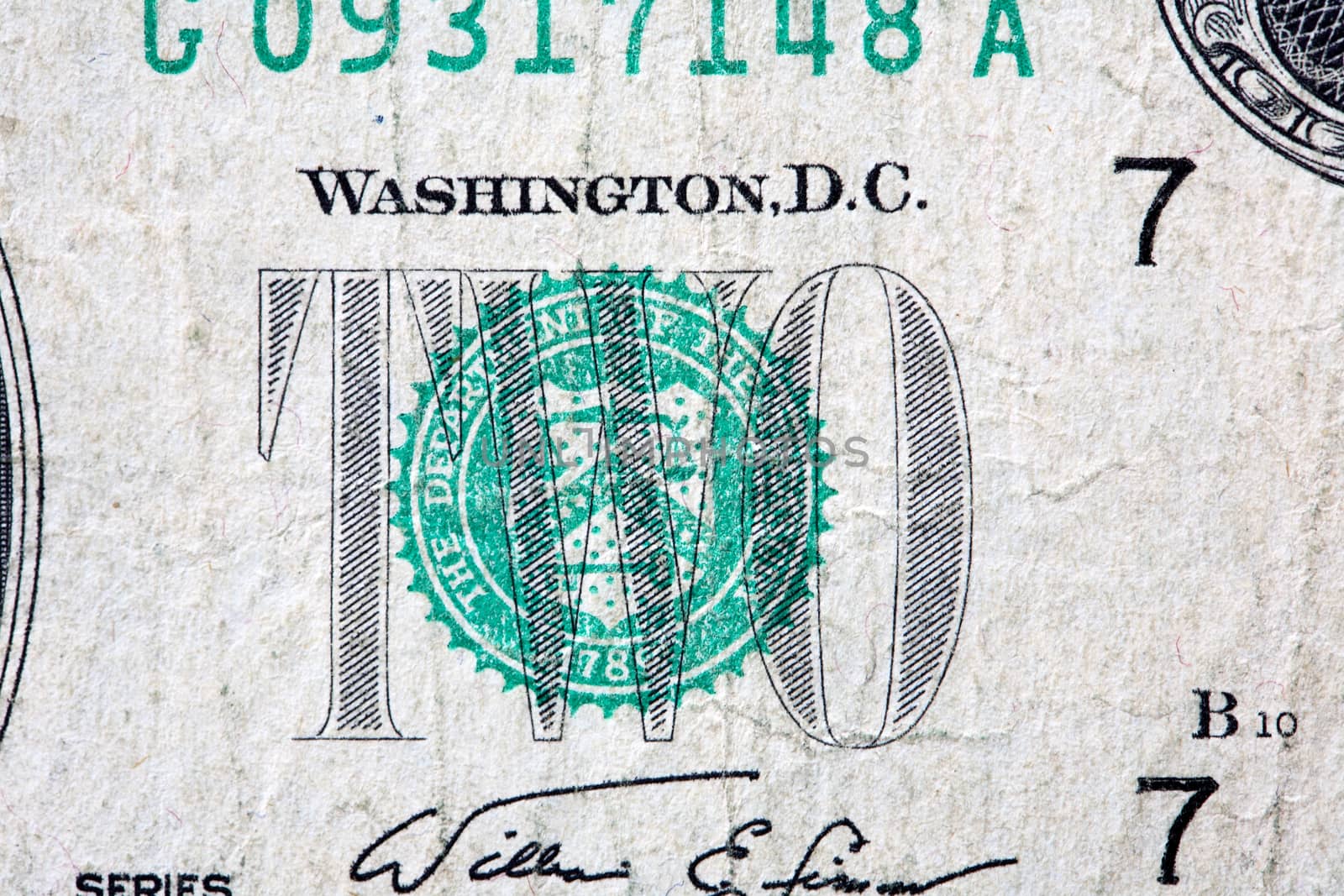 Fragment of old two USA dollar banknote extreme closeup