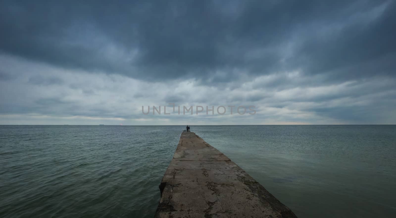 Odessa, Ukraine - 09.09.2018. Otrada beach in Odessa, Ukraine, in a gloomy summer morning. Dark clouds asperatus over the sea until dawn.