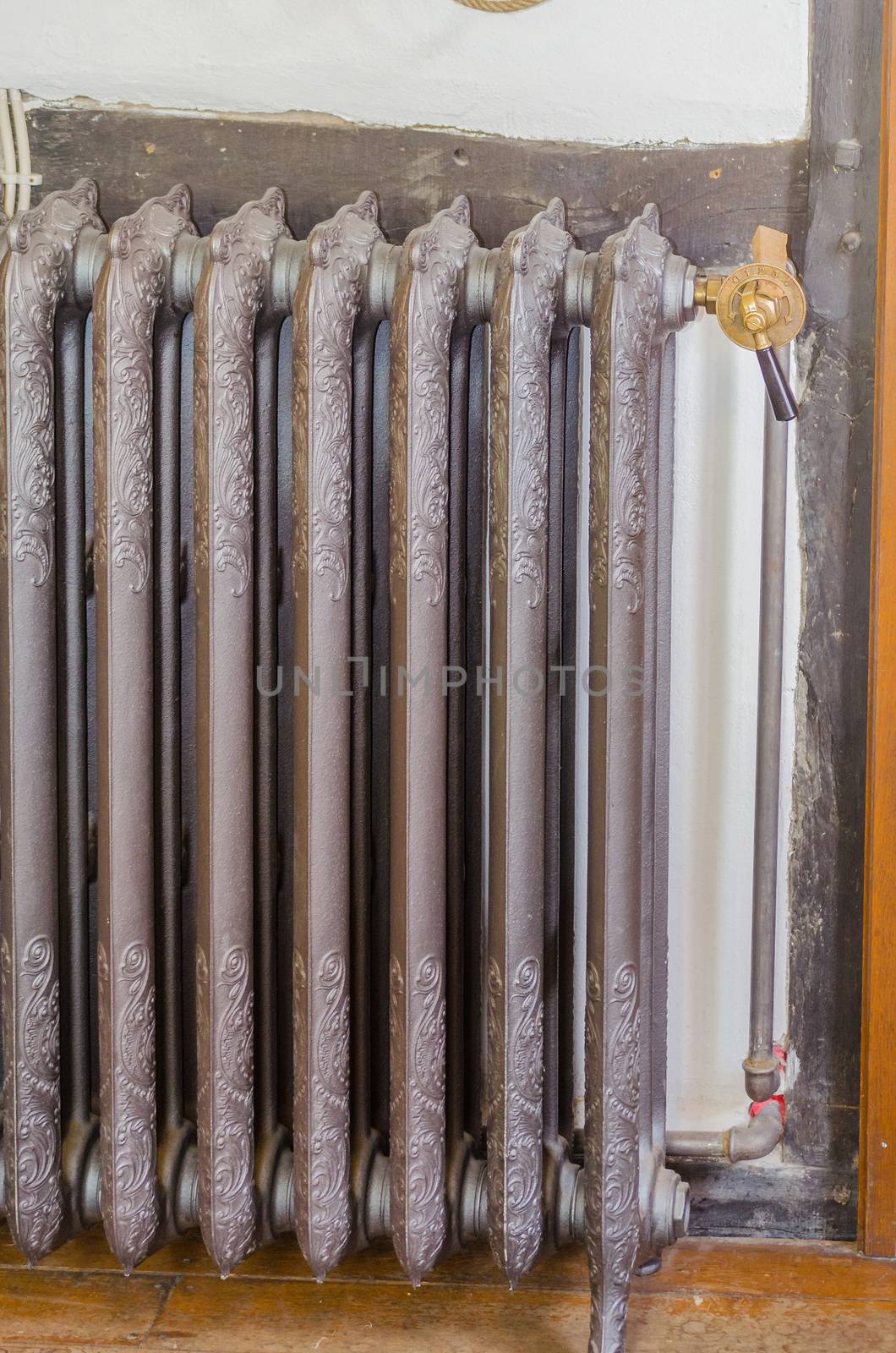 An antique vintage radiator of a central heating system