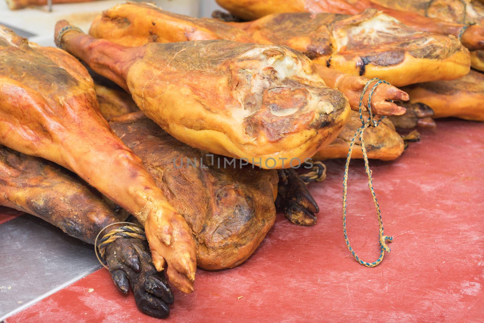 Pile of hams in the butchery