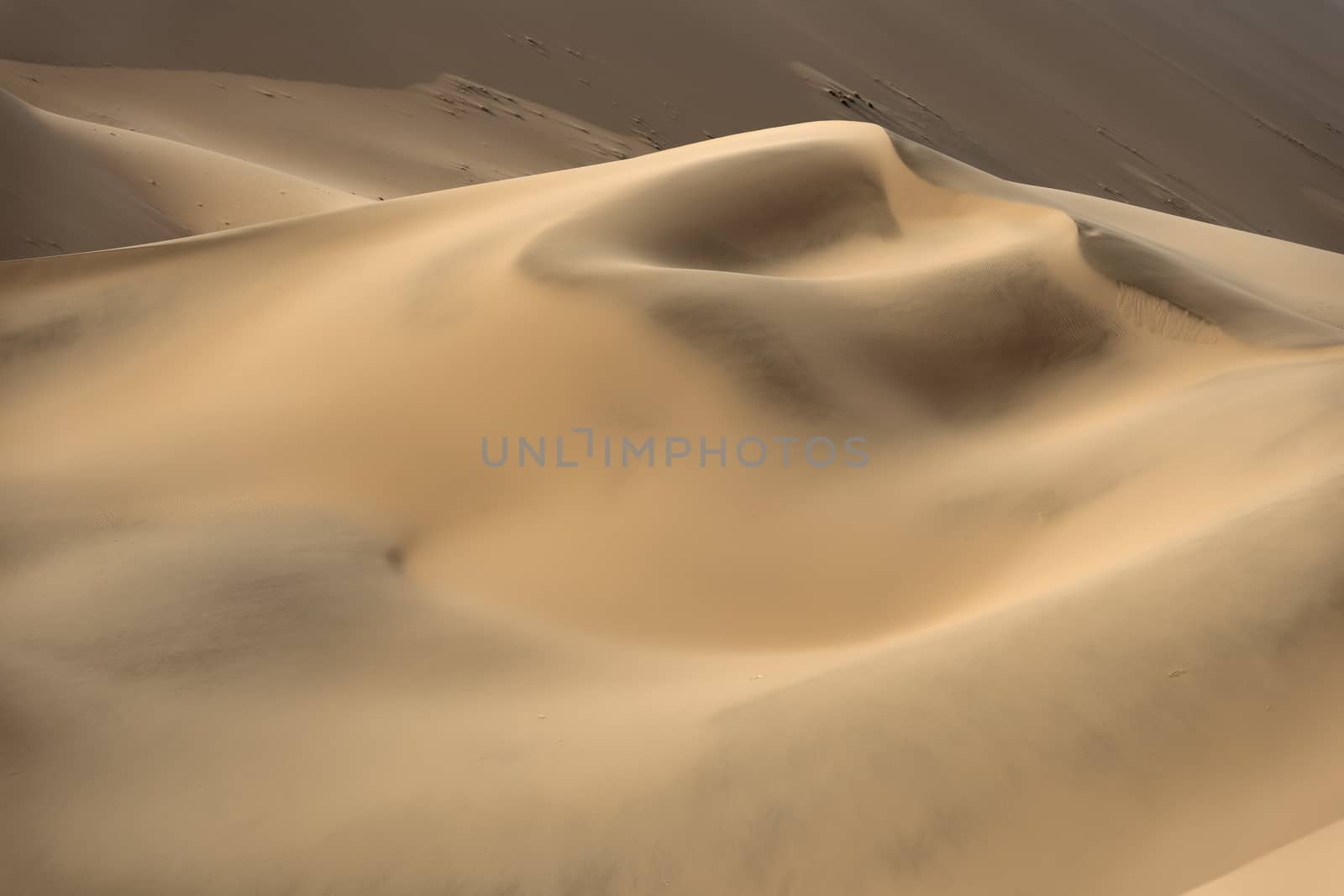 Beautiful sand patterns with light and shadows in the dunes of the Namib-Naukluft National Park, Namibia