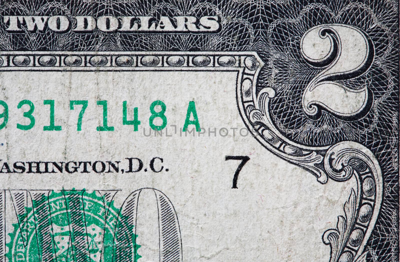 Fragment of old two USA dollar banknote extreme closeup