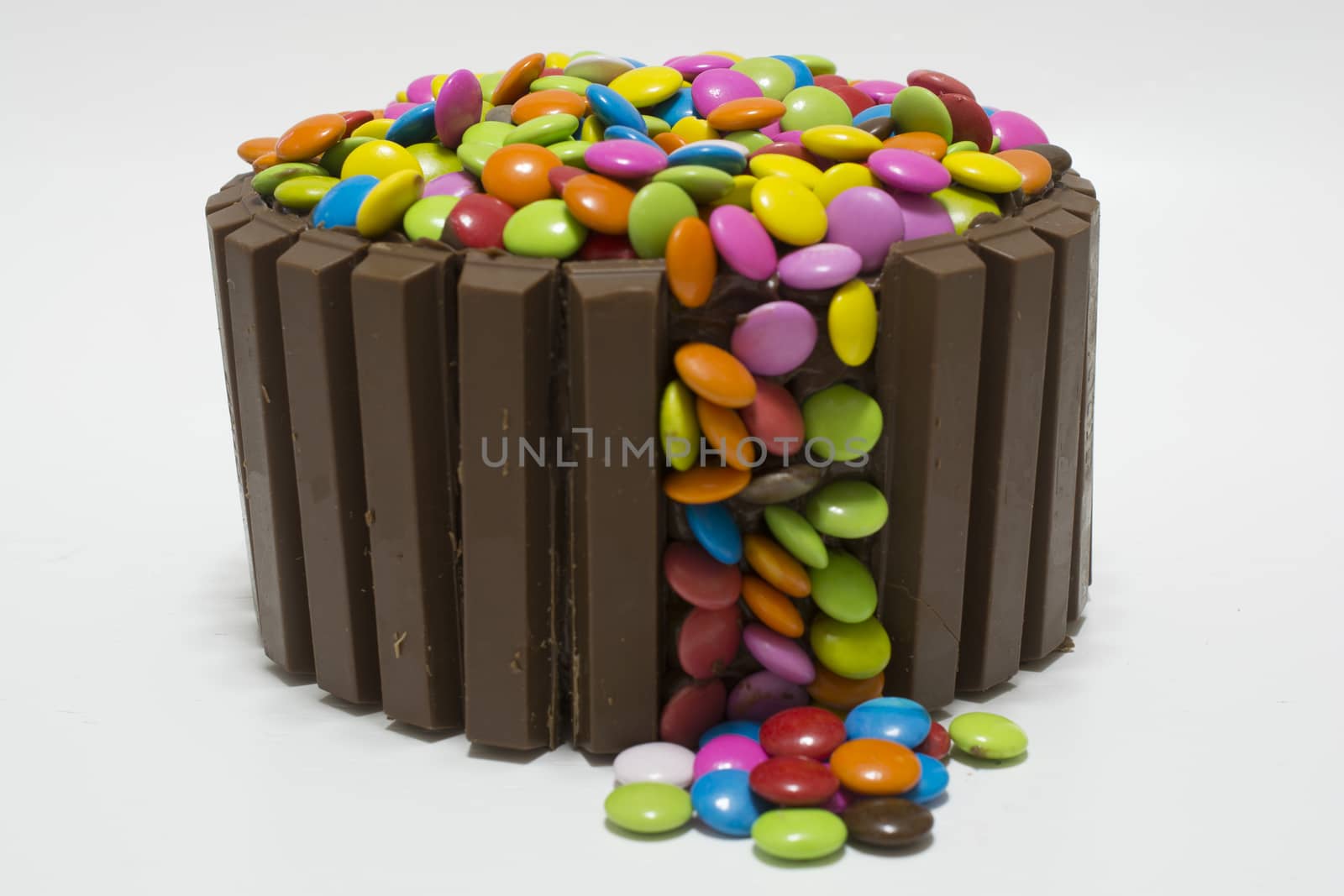 chocolate cake. decorated with chocolate waffles and candy