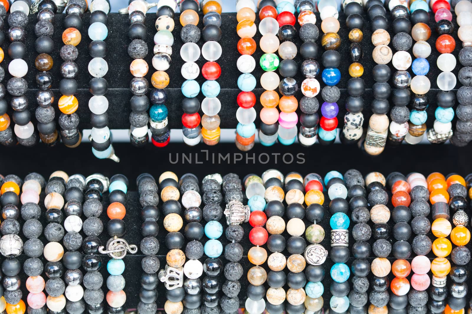 colored, made of various stones, embroidered with silver. rosary