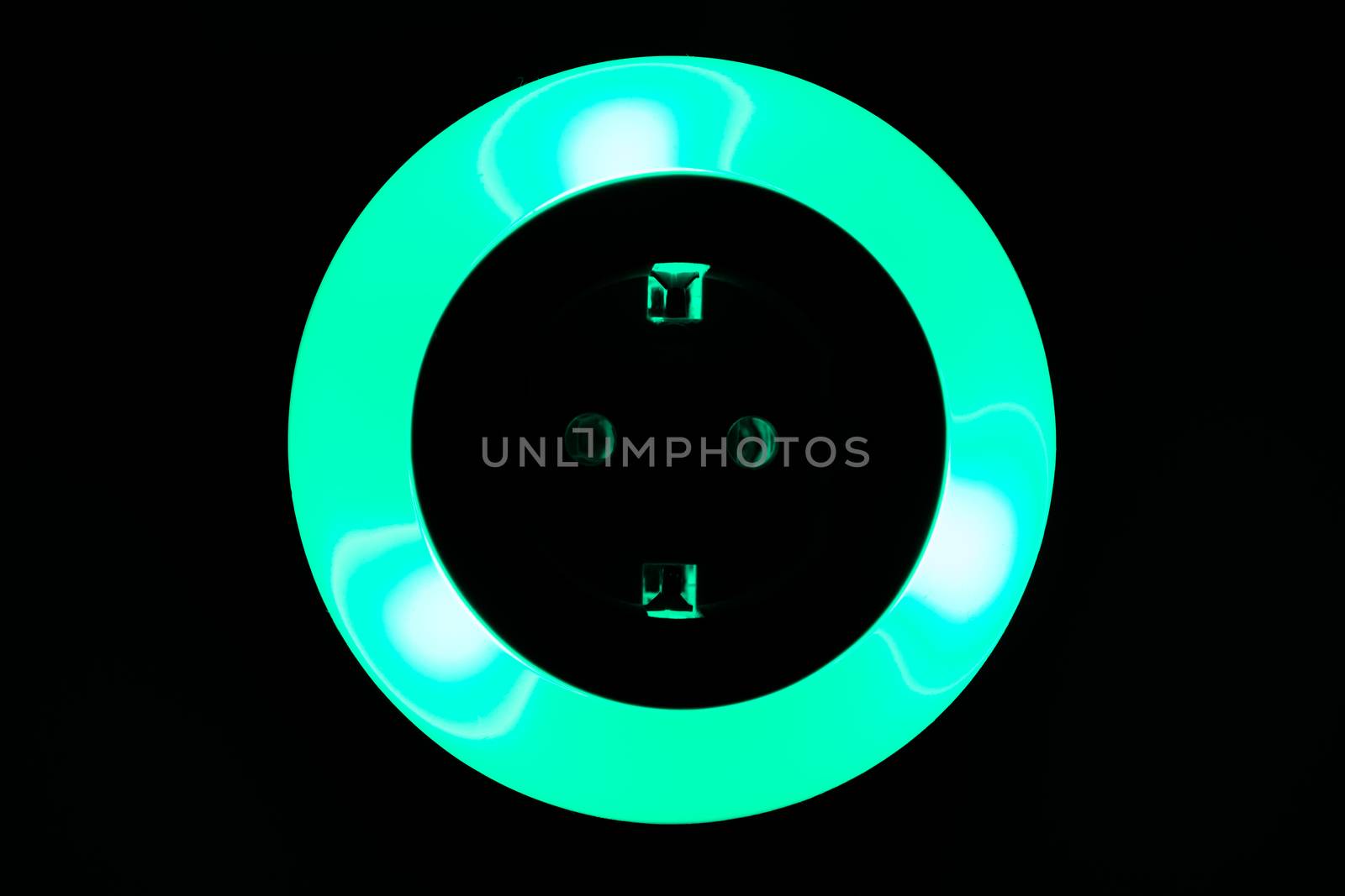 Lamp night light in a dark background. Vintage effect style picture. colorful night light. ring lamp. Neon light circle. the light takes the shape of a circle