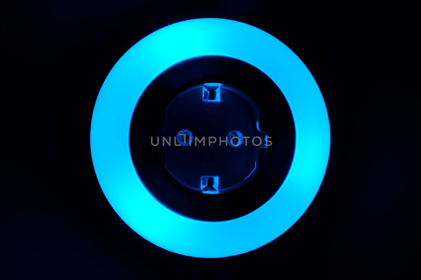Lamp night light in a dark background. Vintage effect style picture. colorful night light. ring lamp. Neon light circle. the light takes the shape of a circle