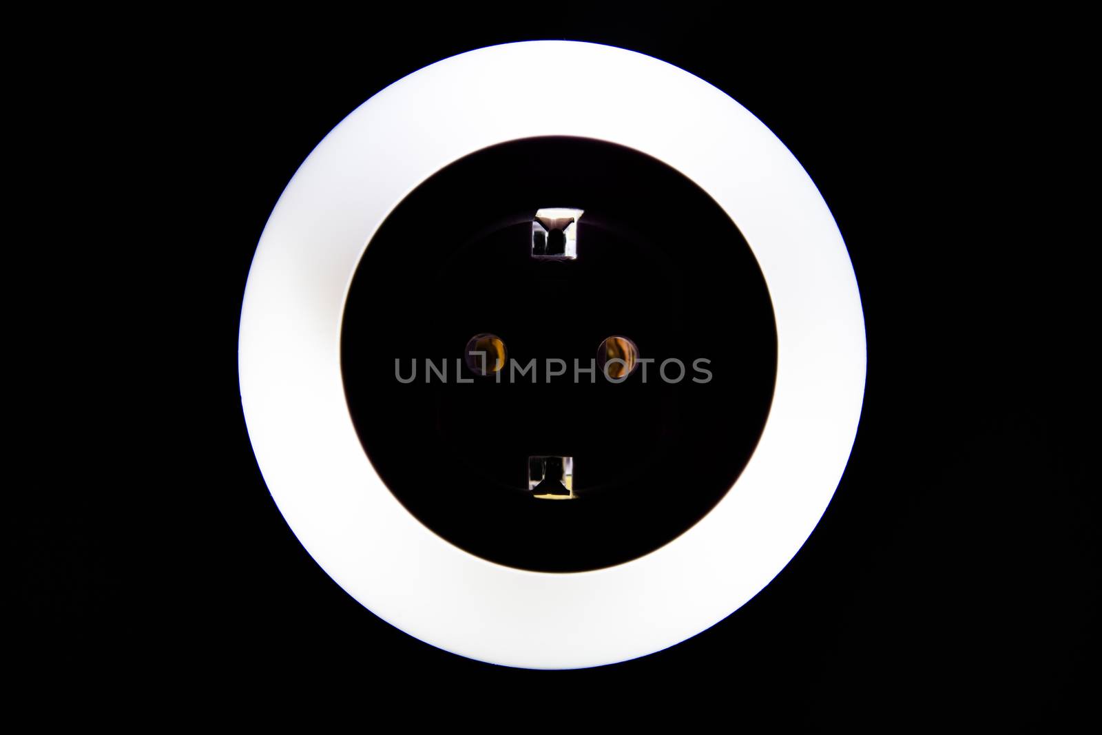 Lamp night light in a dark background. Vintage effect style picture. colorful night light. ring lamp. Neon light circle. the light takes the shape of a circle