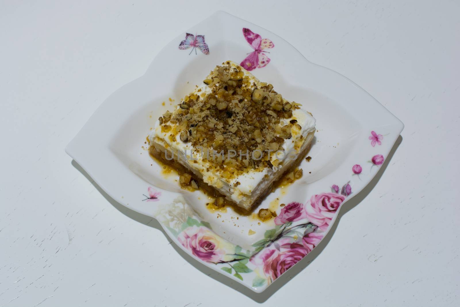 Fake bread dessert  from "Balikesir" Cuisine. creamy and walnut decorated Turkish dessert