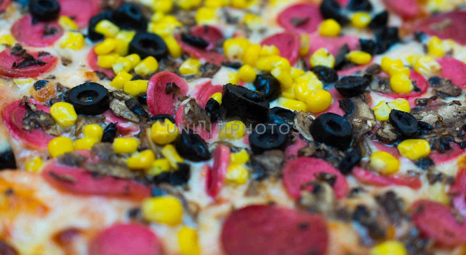 mixed pizza with vegetable and meat. color looks