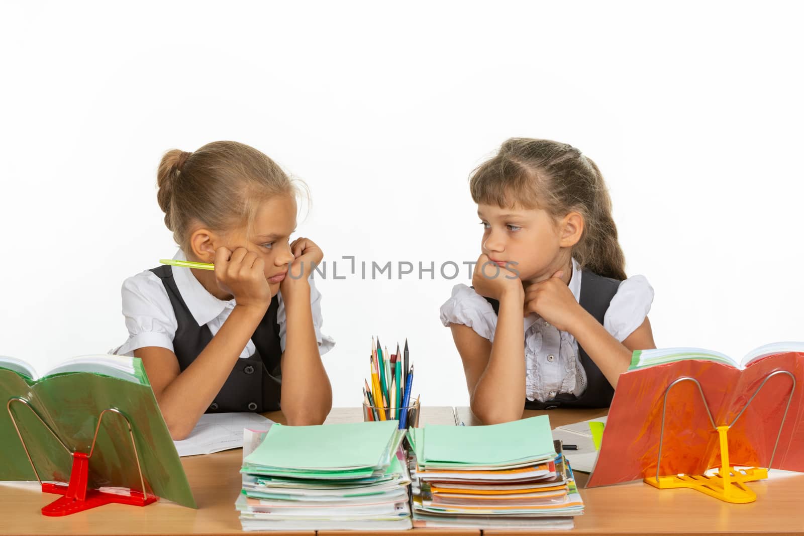 Sad schoolgirls in class received a deuce, and looked at each other