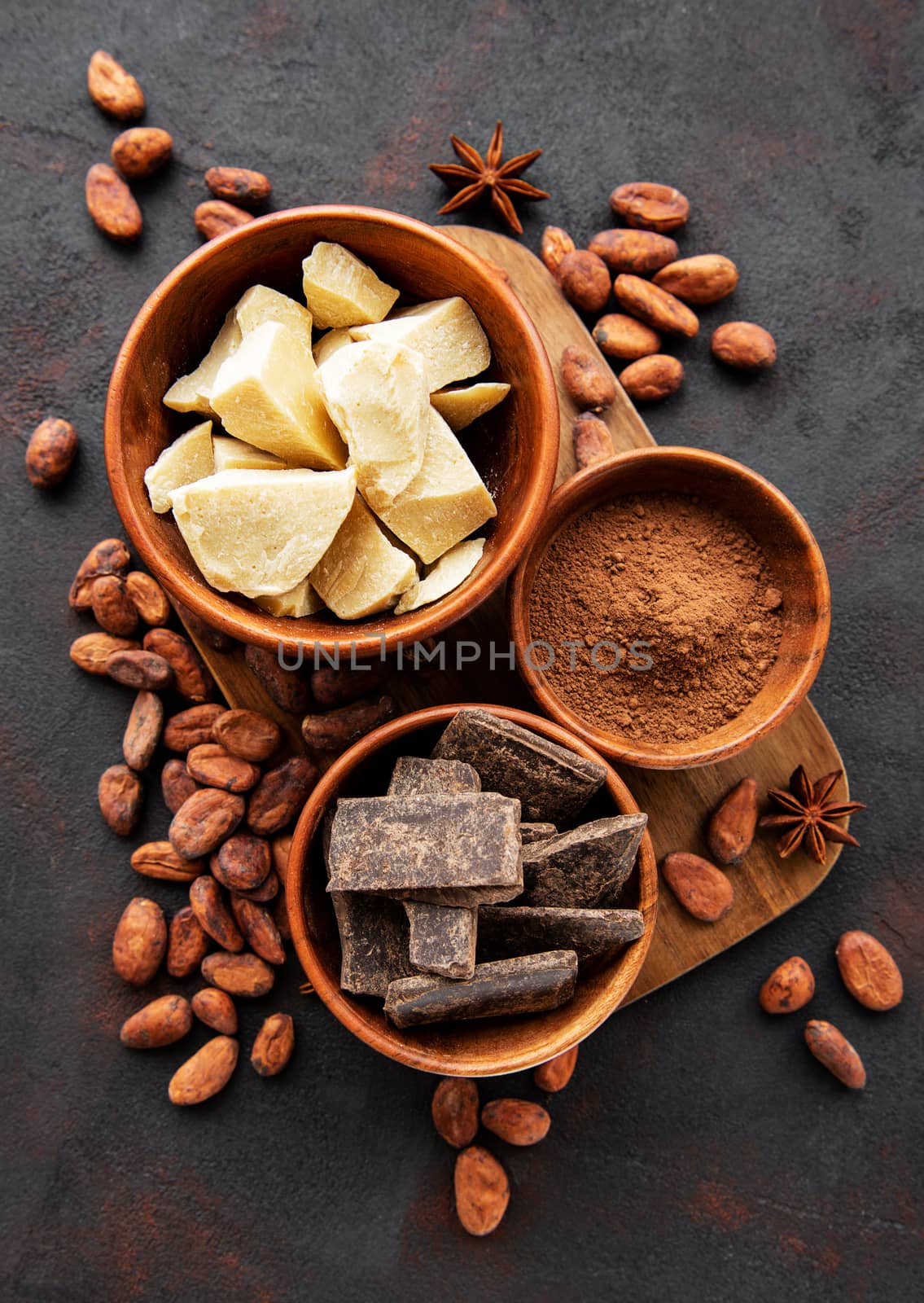 Cocoa beans, butter and chocolate by Almaje