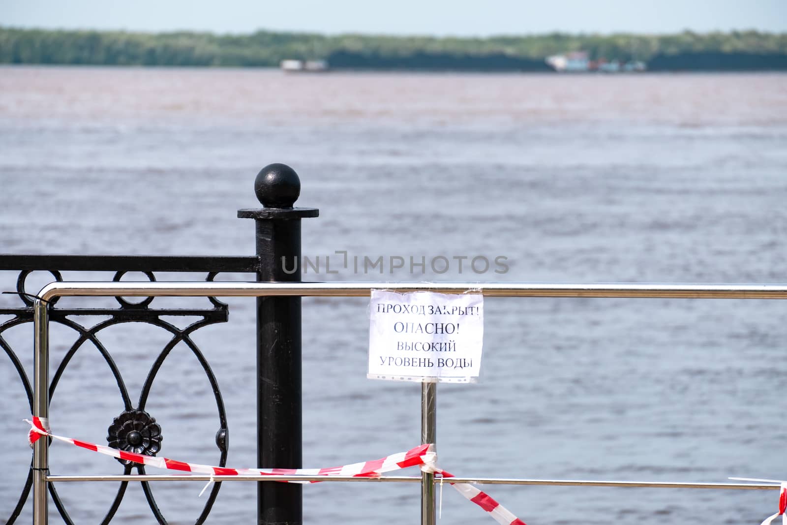 Khabarovsk, Russia - Aug 08, 2019: Flood on the Amur river near the city of Khabarovsk. The level of the Amur river at around 159 centimeters. by rdv27