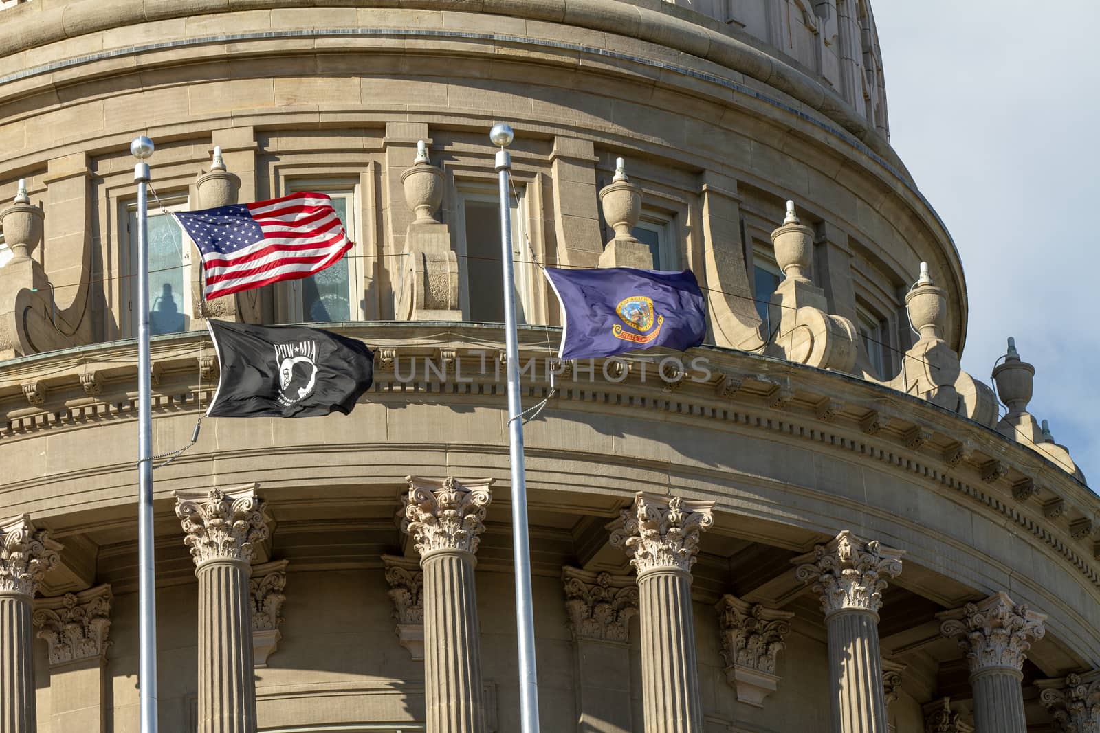 flags flying proudly at the Boise Capital building