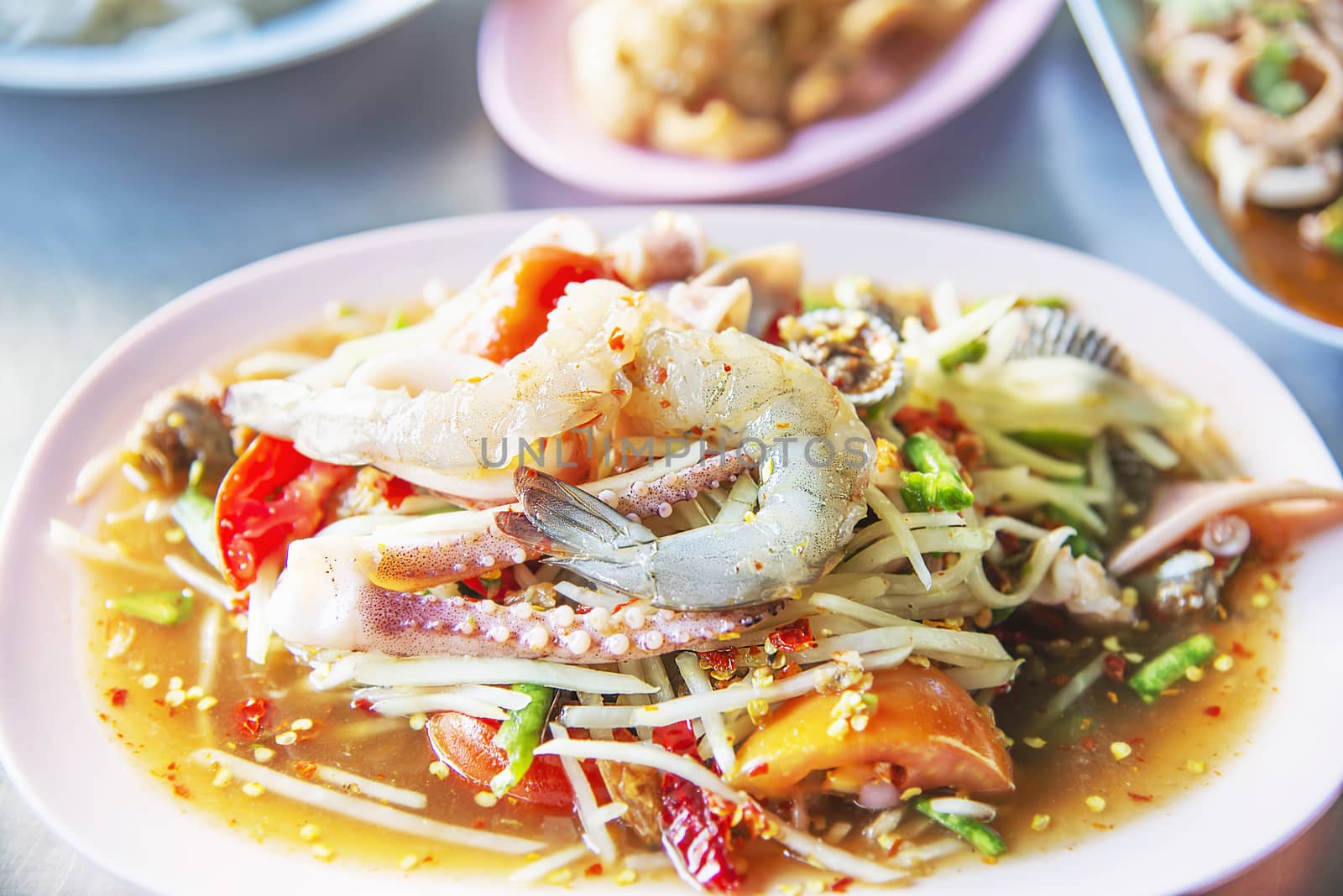 Thai spicy seafood papaya salad - Thai famous food recipe