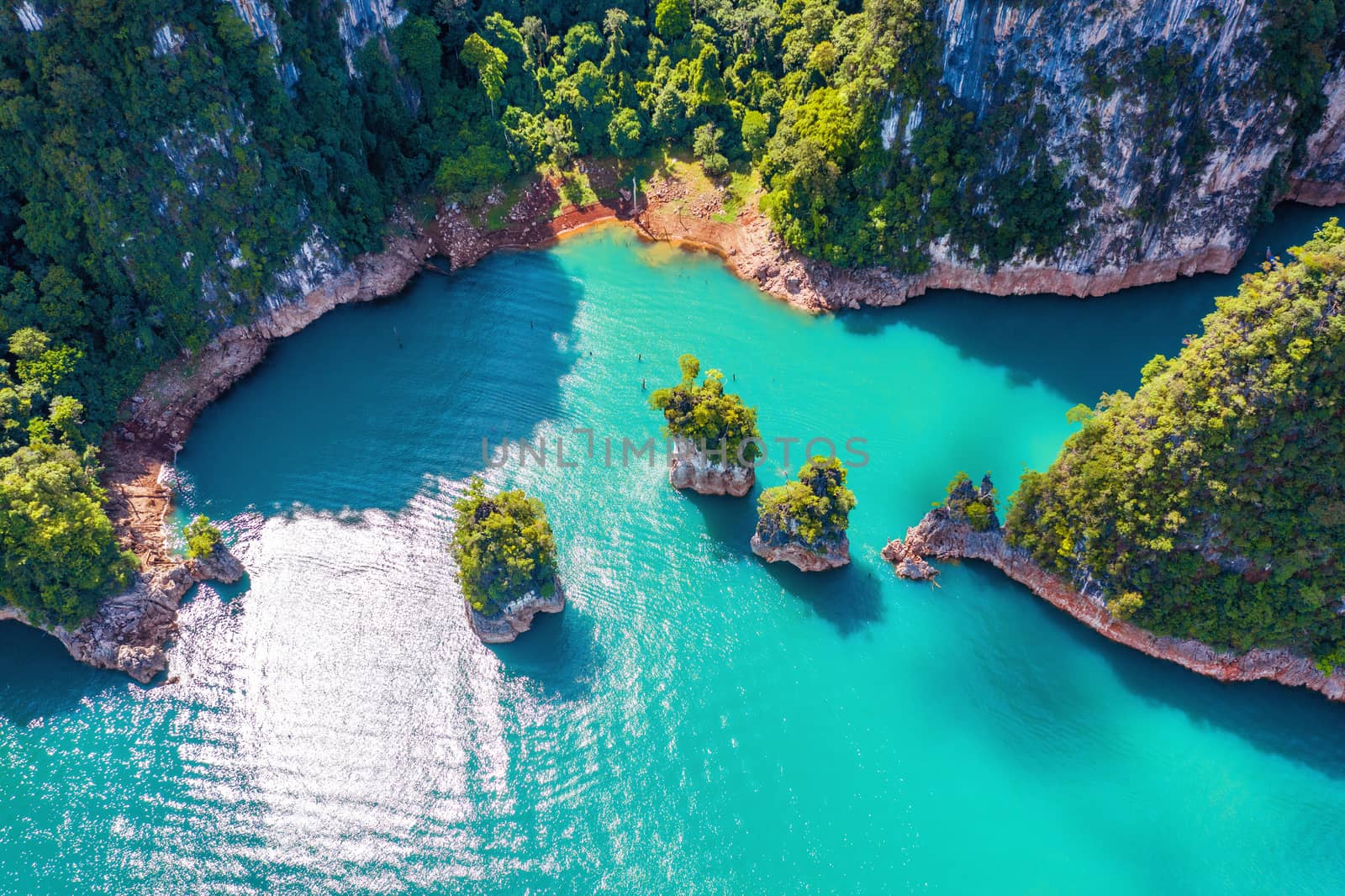 Aerial view of Beautiful mountains in Ratchaprapha Dam at Khao Sok National Park, Surat Thani Province, Thailand. by gutarphotoghaphy