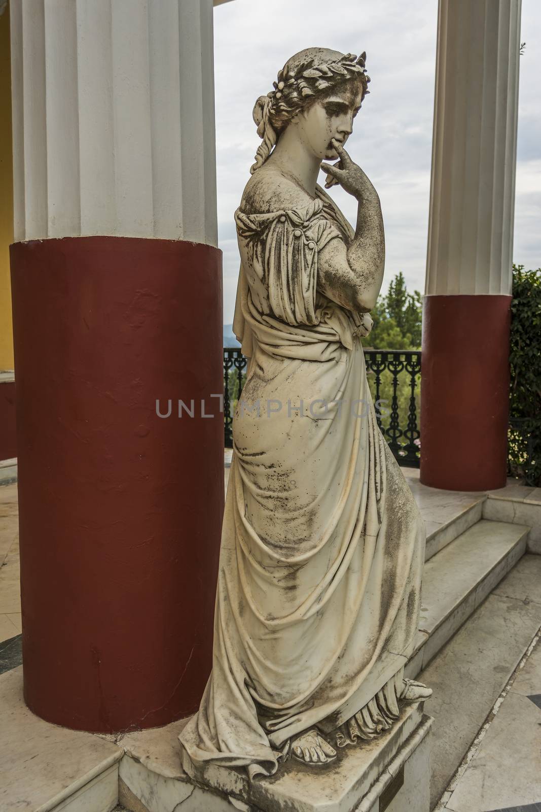Achilleion palace, Corfu, Greece - August 24, 2018: Statue of a Greek mythical muse in the Achilleion palace in Corfu, Greece