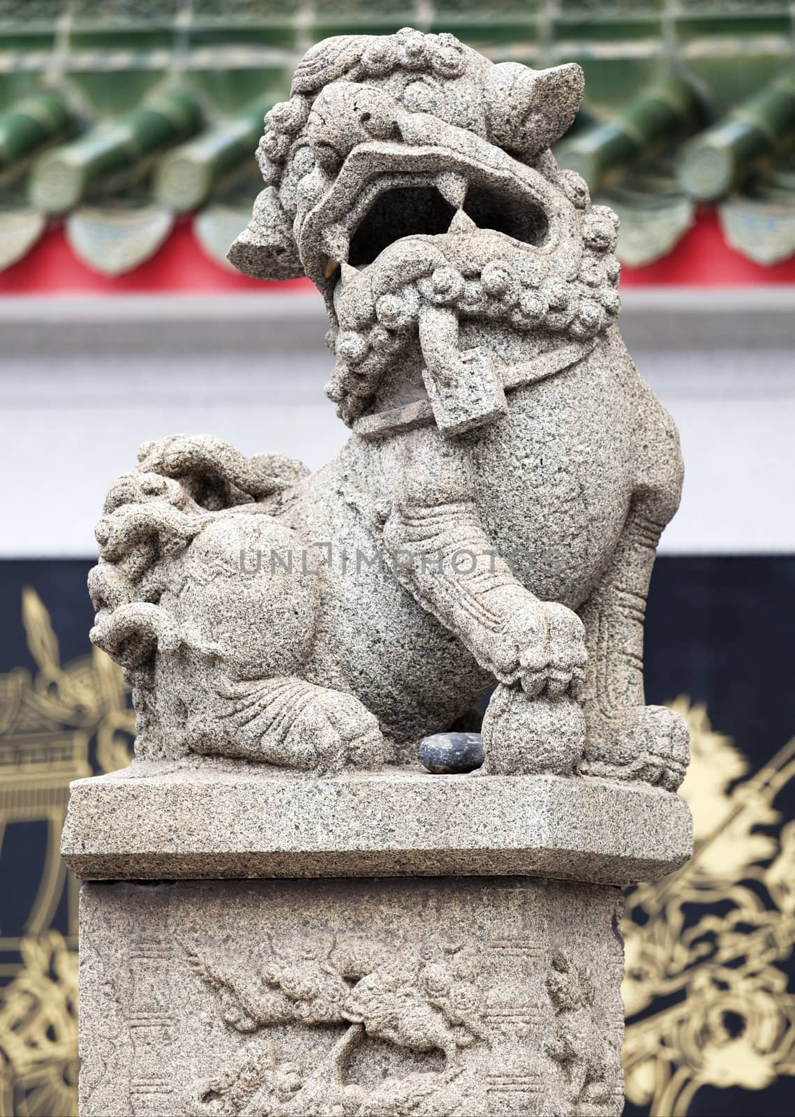 Marble lion at the entrance of a temple, Vietnam