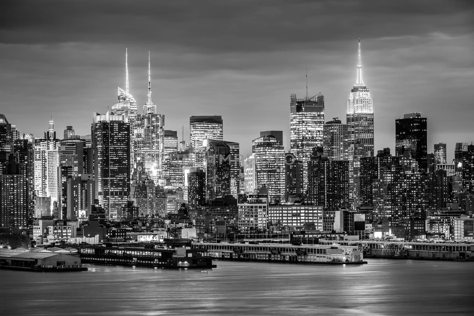 West New York City midtown Manhattan skyline view from Boulevard East Old Glory Park over Hudson River at dusk. by kasto