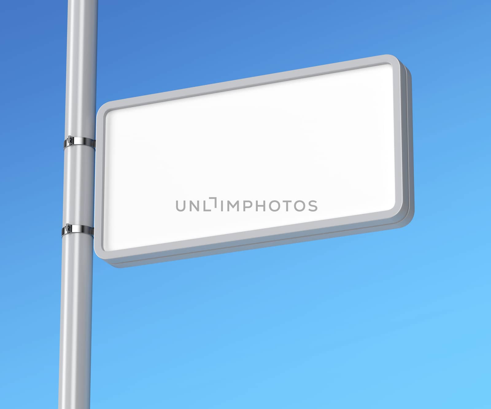 Blank billboard attached on column against blue sky 