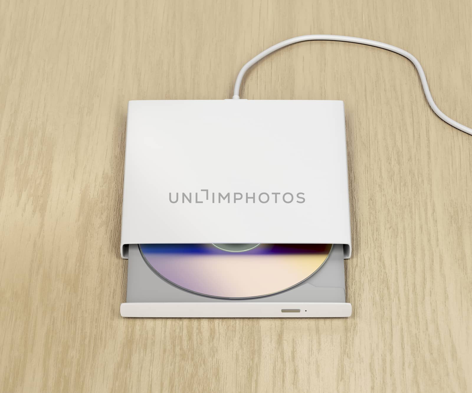 External optical disc drive on wood background
