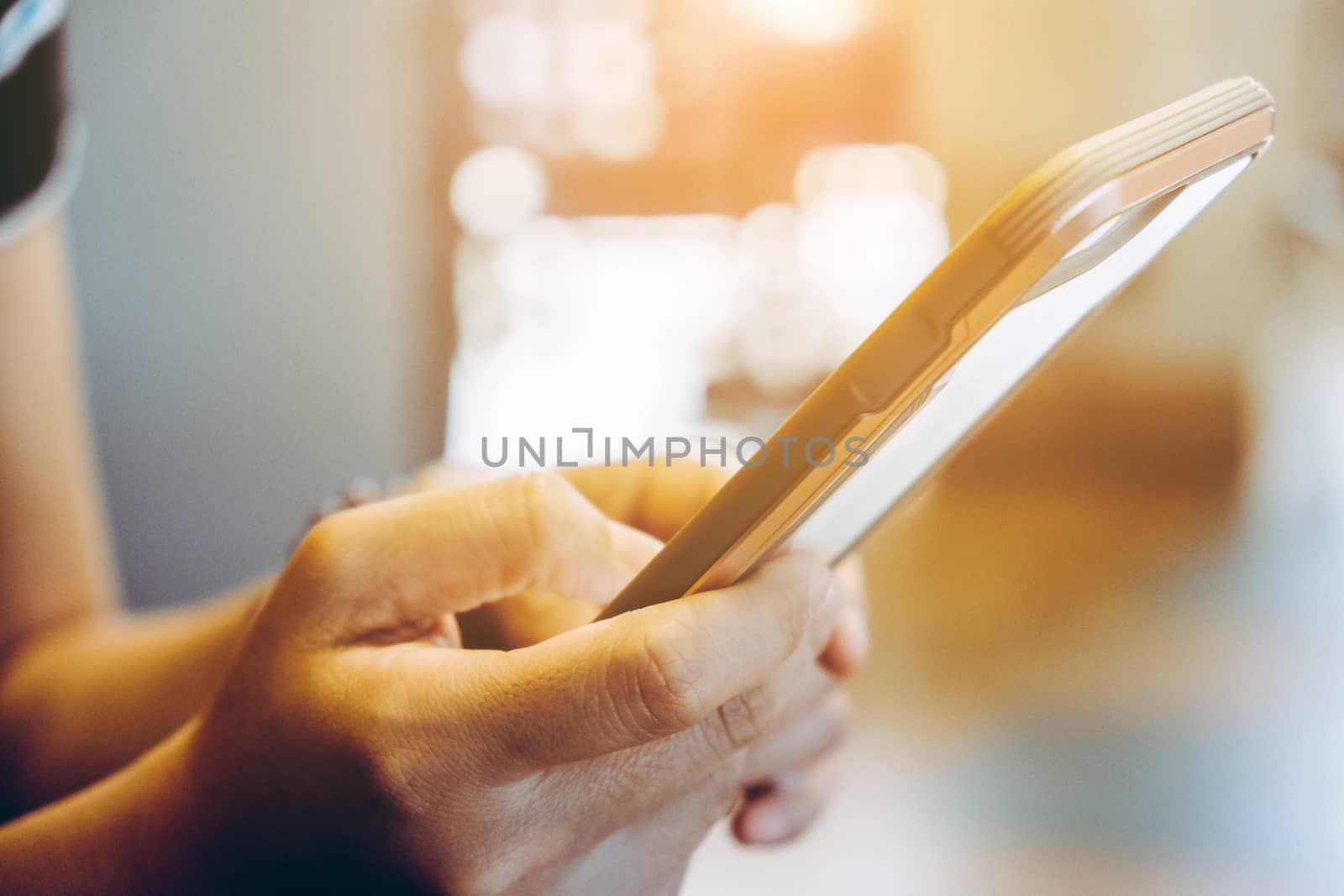 Girl hand holding a smart phone